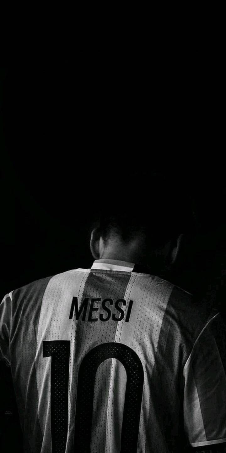 The bold "MESSI" name and "10" proudly stand on the iconic striped jersey in this striking 4K wallpaper, captured against a deep, dark background. This legendary image makes an exceptional wallpaper for iPhone screens, celebrating the football icon. | football iphone messi soccer wallpaper lionel messi mobile 4k wallpaper hd wallpaper number 10 sports icon argentina jersey The bold "MESSI" name and "10" proudly stand on the iconic striped jersey in this striking 4K wallpaper, captured against a deep, dark background. This legendary image makes an exceptional wallpaper for iPhone screens, celebrating the football icon.