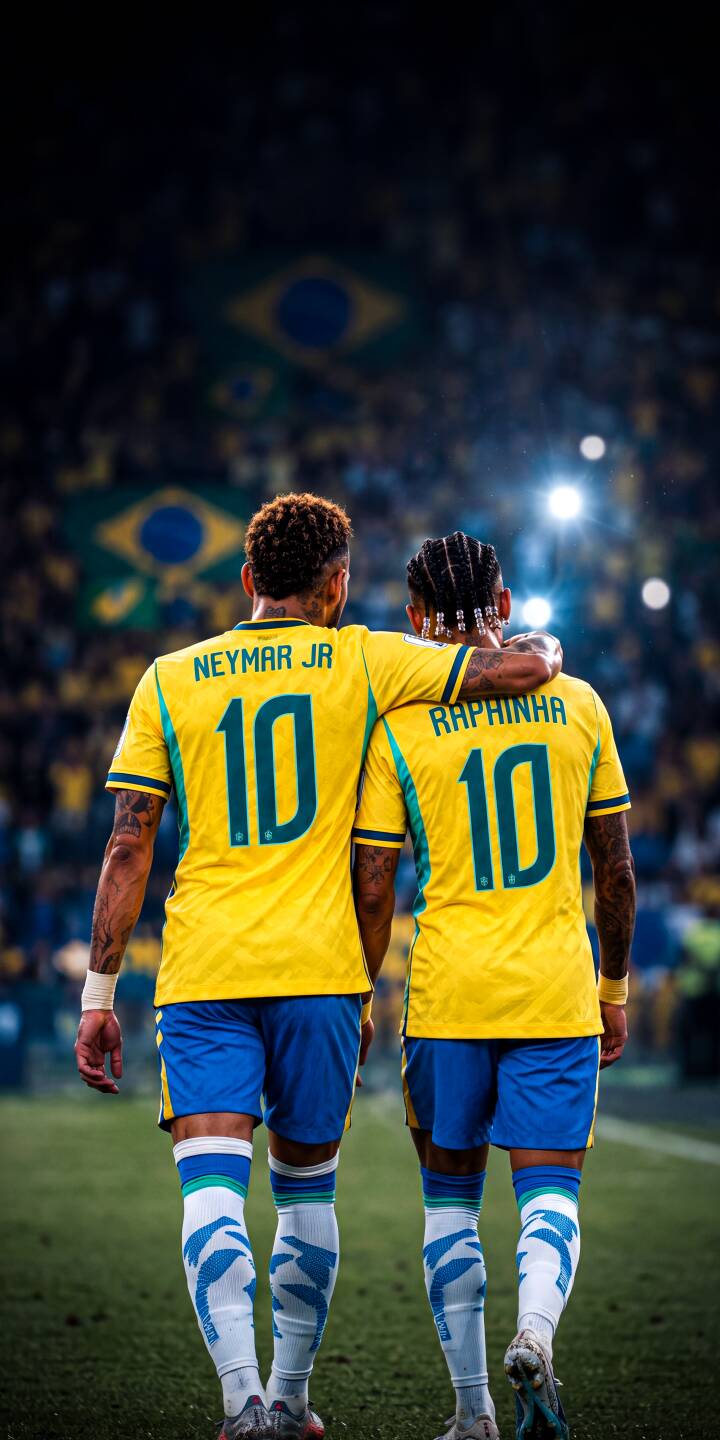 The vibrant yellow number 10 jerseys of Neymar Jr. and Raphinha brightly illuminate the dark stadium backdrop as they walk arm-in-arm, captured in this inspiring 4K football wallpaper. This camaraderie-filled wallpaper is a perfect fit for any iPhone. | football stadium iphone soccer wallpaper raphinha brazil neymar mobile 4k wallpaper hd wallpaper friendship The vibrant yellow number 10 jerseys of Neymar Jr. and Raphinha brightly illuminate the dark stadium backdrop as they walk arm-in-arm, captured in this inspiring 4K football wallpaper. This camaraderie-filled wallpaper is a perfect fit for any iPhone.