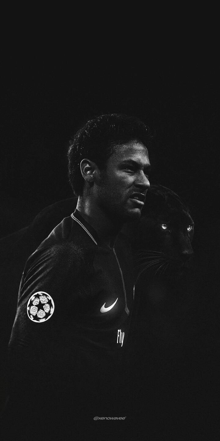 Neymar stands alongside a powerful black panther, symbolizing instinct, confidence, and the fearless mentality behind one of football's most creative players. | black barcelona goat psg neymar Neymar stands alongside a powerful black panther, symbolizing instinct, confidence, and the fearless mentality behind one of football's most creative players.