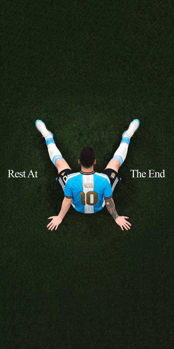 The inspiring text "Rest At The End" frames Lionel Messi sitting uniquely on a dark green field in this serene 4K wallpaper. Dressed in his iconic Argentina number 10 jersey, this visually striking wallpaper is perfect for any iPhone displaying a blend of reflection and athletic spirit. | football quote athlete iphone messi argentina wallpaper lionel messi mobile 4k wallpaper hd wallpaper inspirational The inspiring text "Rest At The End" frames Lionel Messi sitting uniquely on a dark green field in this serene 4K wallpaper. Dressed in his iconic Argentina number 10 jersey, this visually striking wallpaper is perfect for any iPhone displaying a blend of reflection and athletic spirit.