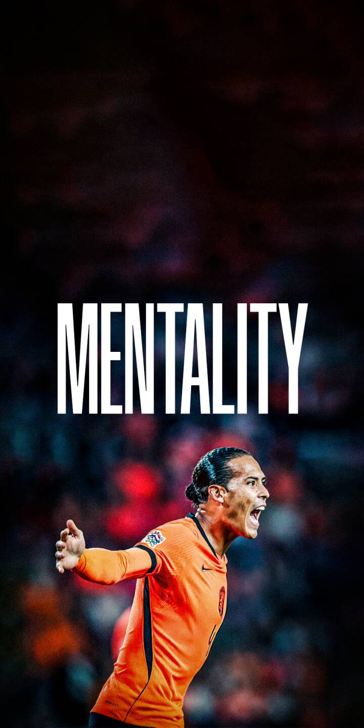 Virgil van Dijk's powerful roar and determined expression are captured beneath the bold 'MENTALITY' text in this striking 4K wallpaper, making it a motivational wallpaper for iPhone users and football fans alike. | sports football iphone soccer wallpaper van dijk virgil van dijk mobile mentality 4k wallpaper hd wallpaper netherlands Virgil van Dijk's powerful roar and determined expression are captured beneath the bold 'MENTALITY' text in this striking 4K wallpaper, making it a motivational wallpaper for iPhone users and football fans alike.