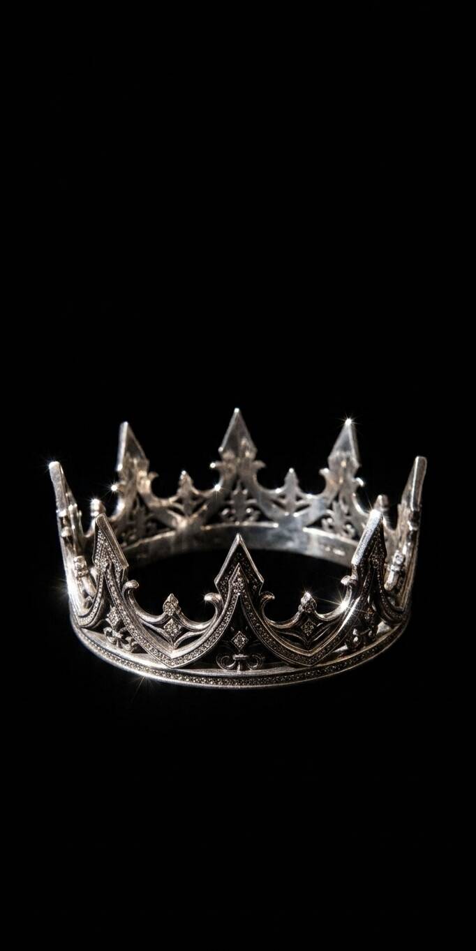 The exquisite silver crown, shimmering with subtle light against a deep black background, offers a majestic 4K wallpaper for your iPhone and perfectly encapsulates royal elegance. | famous🤑 The exquisite silver crown, shimmering with subtle light against a deep black background, offers a majestic 4K wallpaper for your iPhone and perfectly encapsulates royal elegance.