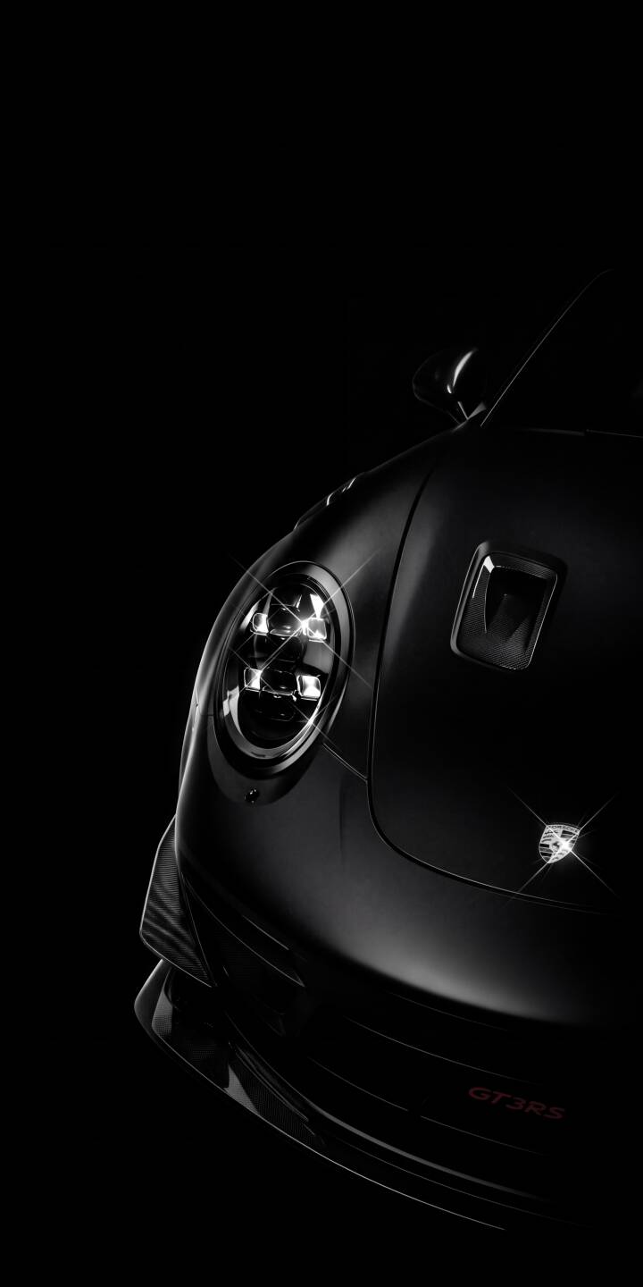 The intense gleam of the quad LED headlights pierces through the dark, showcasing the iconic Porsche 911 GT3 RS in this stunning 4K wallpaper. This sleek, minimalist wallpaper perfectly captures the car's luxurious power and is an ideal choice for iPhone users. | sports car dark iphone porsche luxury wallpaper mobile porsche 911 gt3 rs 4k wallpaper hd wallpaper automotive The intense gleam of the quad LED headlights pierces through the dark, showcasing the iconic Porsche 911 GT3 RS in this stunning 4K wallpaper. This sleek, minimalist wallpaper perfectly captures the car's luxurious power and is an ideal choice for iPhone users.