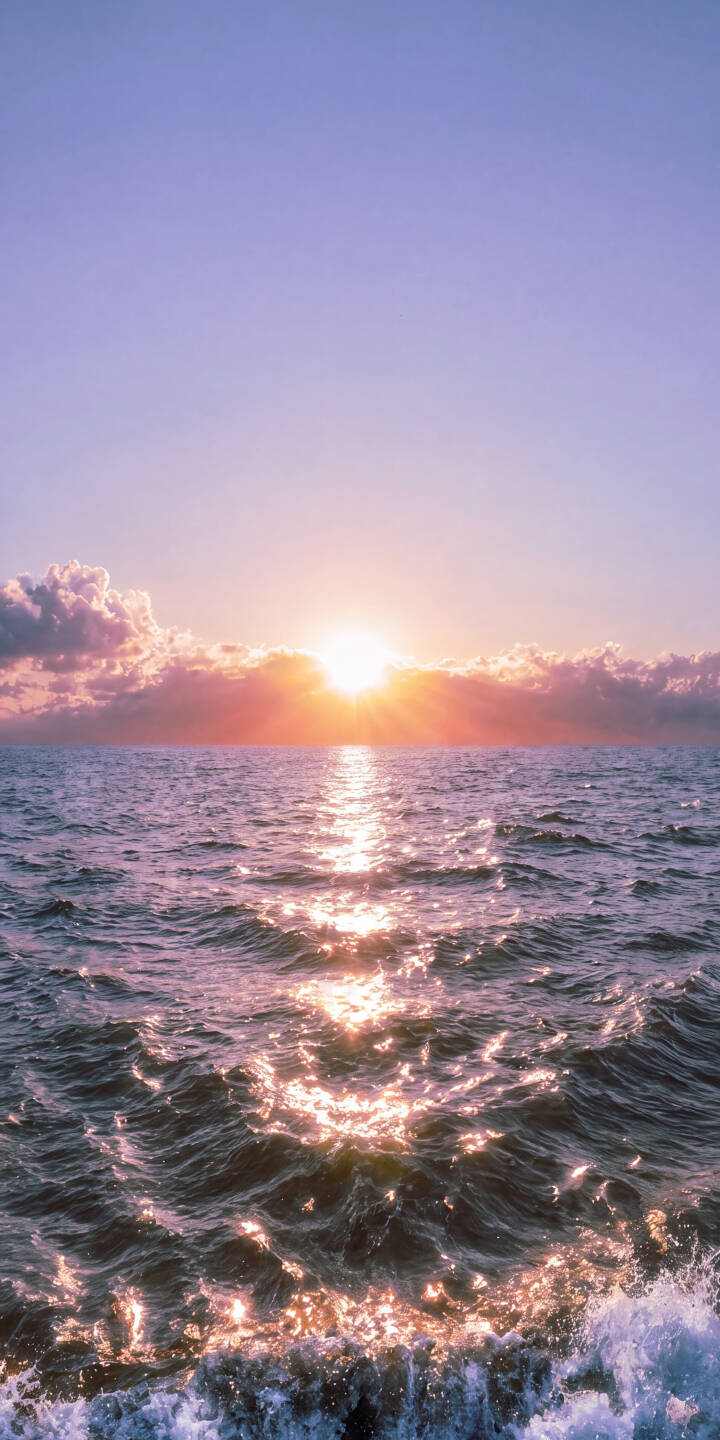 The sun casts a radiant, glittering path across the deep purple ocean as soft, pink-tinged clouds embrace the sunset in this stunning 4K wallpaper — a truly serene ocean wallpaper for iPhone users. | aesthetic sunset sea iphone nature ocean wallpaper mobile 4k wallpaper hd wallpaper glitter serene The sun casts a radiant, glittering path across the deep purple ocean as soft, pink-tinged clouds embrace the sunset in this stunning 4K wallpaper — a truly serene ocean wallpaper for iPhone users.