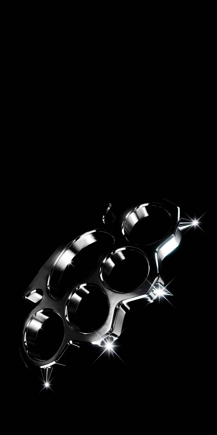 Glistening chrome knuckles sparkle against a pure black background in this intense 4K wallpaper, making for a striking wallpaper for iPhone users. | dark weapon chrome iphone wallpaper knuckles mobile metallic 4k wallpaper hd wallpaper sparkle brass knuckles Glistening chrome knuckles sparkle against a pure black background in this intense 4K wallpaper, making for a striking wallpaper for iPhone users.