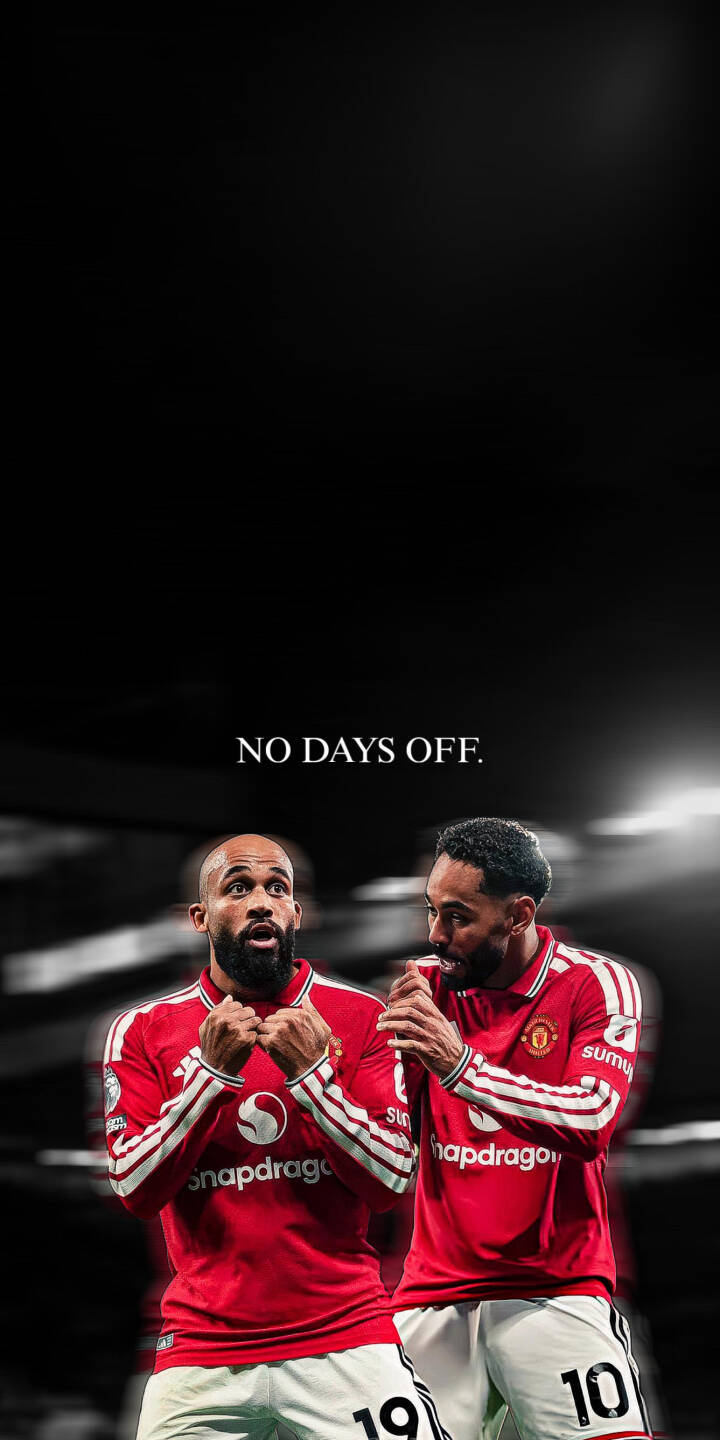 The compelling 'NO DAYS OFF.' motto reinforces the focused expressions of two Manchester United stars, captured in this striking 4K football wallpaper perfect for iPhone. | sports football motivational iphone soccer wallpaper mobile manchester united 4k wallpaper hd wallpaper red kit man utd cunha mbeumo The compelling 'NO DAYS OFF.' motto reinforces the focused expressions of two Manchester United stars, captured in this striking 4K football wallpaper perfect for iPhone.