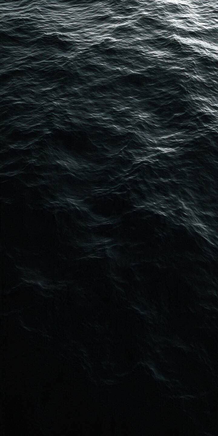 Dark ocean waves ripple across an endless expanse of nearly black water, illuminated by subtle silver reflections near the surface. Delicate textures gradually disappear into deep shadows, creating a striking contrast between light and darkness. The minimalist composition and monochromatic tones capture the mysterious beauty of the sea, evoking feelings of solitude, silence, and the unknown depths of the ocean. | aesthetic dark ocean moody minimalism Dark ocean waves ripple across an endless expanse of nearly black water, illuminated by subtle silver reflections near the surface. Delicate textures gradually disappear into deep shadows, creating a striking contrast between light and darkness. The minimalist composition and monochromatic tones capture the mysterious beauty of the sea, evoking feelings of solitude, silence, and the unknown depths of the ocean.