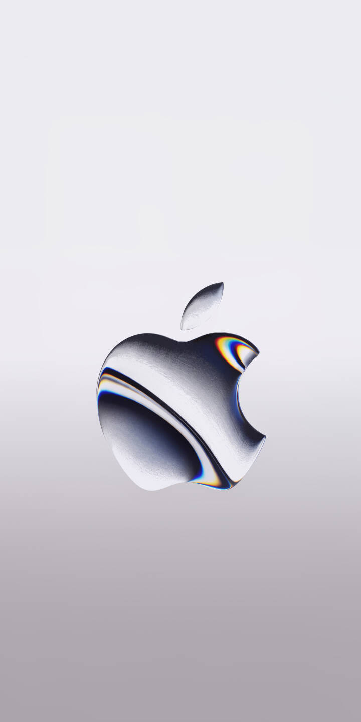 The iconic Apple logo shines with an iridescent, rainbow-like refraction, casting colorful light across its sleek metallic surface against a clean grey background. This stunning 4K wallpaper offers a modern and aesthetic Apple logo wallpaper perfect for personalizing your iPhone. | aesthetic apple iphone minimalist wallpaper apple logo mobile iridescent 4k wallpaper hd wallpaper sleek prismatic The iconic Apple logo shines with an iridescent, rainbow-like refraction, casting colorful light across its sleek metallic surface against a clean grey background. This stunning 4K wallpaper offers a modern and aesthetic Apple logo wallpaper perfect for personalizing your iPhone.
