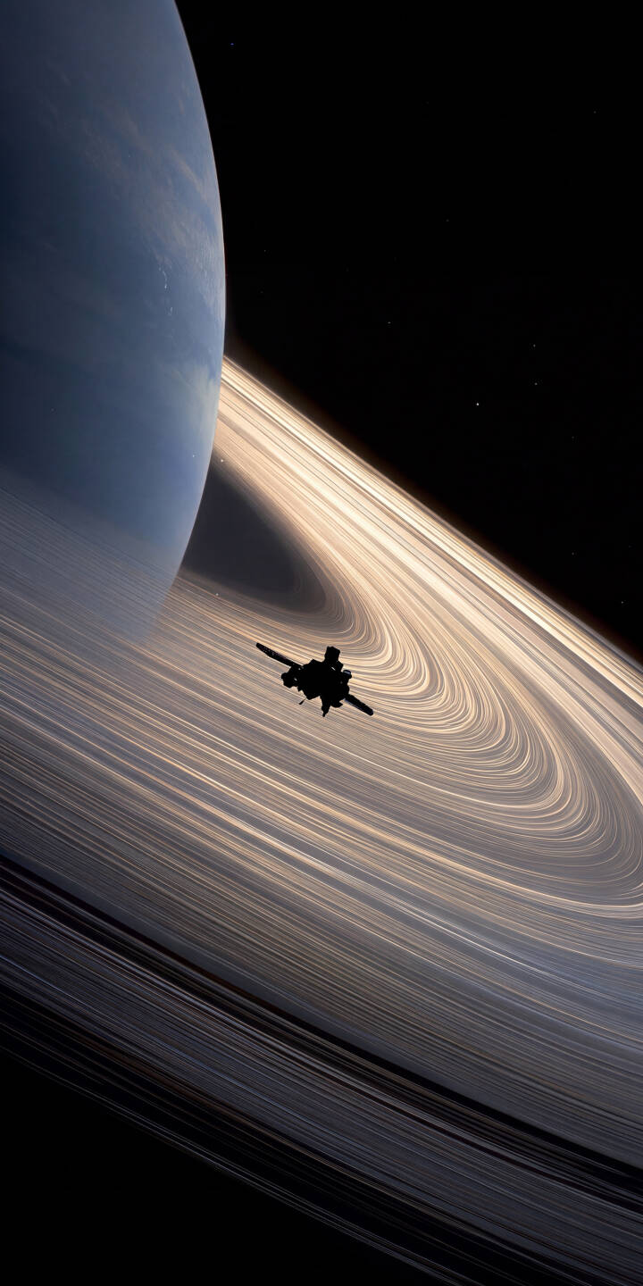 A solitary spacecraft appears as a dark silhouette against the luminous, intricate rings of Saturn in this breathtaking 4K space wallpaper — an essential wallpaper for any iPhone user captivated by cosmic beauty. | space planet iphone rings wallpaper saturn spaceship mobile 4k wallpaper hd wallpaper sci-fi cosmic A solitary spacecraft appears as a dark silhouette against the luminous, intricate rings of Saturn in this breathtaking 4K space wallpaper — an essential wallpaper for any iPhone user captivated by cosmic beauty.