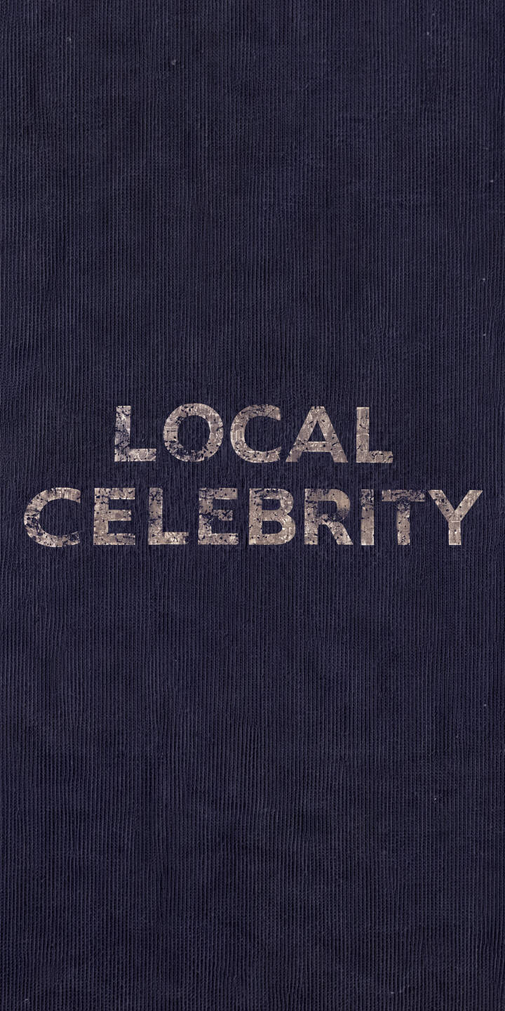 The bold, distressed text of "LOCAL CELEBRITY" stands out against a deep navy background in this minimalist 4K wallpaper, featuring a subtle vertical fabric texture. This unique and edgy wallpaper is perfect for personalizing your iPhone with a touch of understated cool. | aesthetic text fabric iphone minimalist wallpaper mobile 4k wallpaper hd wallpaper navy distressed local celebrity The bold, distressed text of "LOCAL CELEBRITY" stands out against a deep navy background in this minimalist 4K wallpaper, featuring a subtle vertical fabric texture. This unique and edgy wallpaper is perfect for personalizing your iPhone with a touch of understated cool.