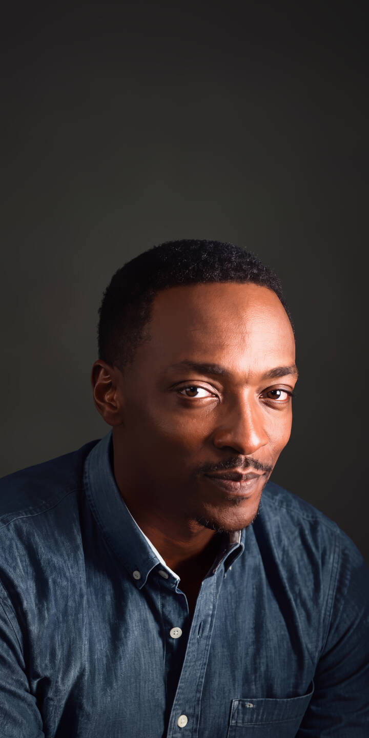 Anthony Mackie's charismatic presence shines through his subtle smirk and direct eye contact in this stunning 4K portrait wallpaper, an ideal wallpaper for your iPhone. | aesthetic portrait actor iphone realistic wallpaper captain america anthony mackie mobile 4k wallpaper hd wallpaper falcon Anthony Mackie's charismatic presence shines through his subtle smirk and direct eye contact in this stunning 4K portrait wallpaper, an ideal wallpaper for your iPhone.