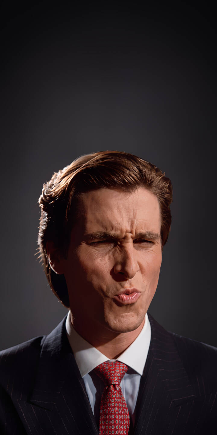 Patrick Bateman's hilarious puckered expression, with his eyes comically squinted and lips pursed, creates an unforgettable meme-worthy 4K wallpaper. This iconic character's sharp pinstripe suit and red tie are vividly captured, making it an ideal iPhone wallpaper for fans of the cult classic. | meme funny suit iphone american psycho wallpaper christian bale patrick bateman mobile 4k wallpaper hd wallpaper cult film Patrick Bateman's hilarious puckered expression, with his eyes comically squinted and lips pursed, creates an unforgettable meme-worthy 4K wallpaper. This iconic character's sharp pinstripe suit and red tie are vividly captured, making it an ideal iPhone wallpaper for fans of the cult classic.