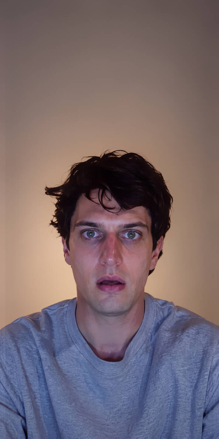 A captivating wide-eyed gaze reveals surprise or anxiety on this man's face, complemented by his messy dark hair and a warm, simple background in this striking 4K wallpaper. It makes for a unique iPhone wallpaper option. | man portrait iphone simple wallpaper surprised mobile 4k wallpaper hd wallpaper expressive anxious wide eyed A captivating wide-eyed gaze reveals surprise or anxiety on this man's face, complemented by his messy dark hair and a warm, simple background in this striking 4K wallpaper. It makes for a unique iPhone wallpaper option.