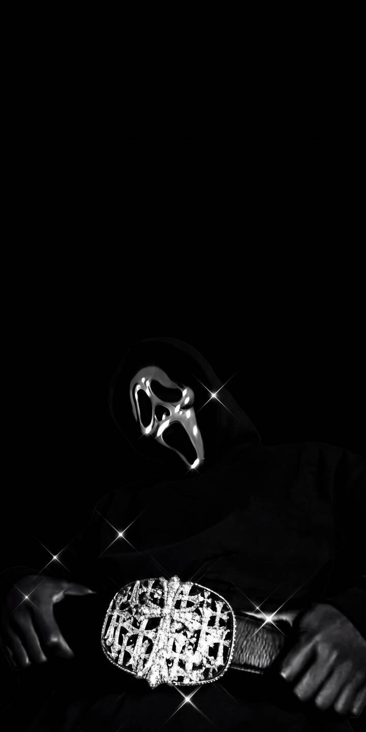 Sparkling silver details highlight the iconic Ghostface mask and an ornate belt buckle in this shadowy 4K wallpaper, making it a perfect dark aesthetic wallpaper for your iPhone. | movie dark iphone wallpaper horror scream sparkling mobile ghostface metallic 4k wallpaper hd wallpaper Sparkling silver details highlight the iconic Ghostface mask and an ornate belt buckle in this shadowy 4K wallpaper, making it a perfect dark aesthetic wallpaper for your iPhone.