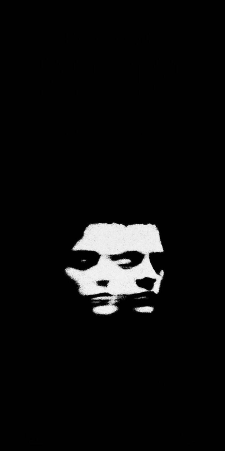 A stark black and white aesthetic defines this abstract 4K wallpaper, featuring a haunting, doubled face against a deep, dark background. This minimalist wallpaper makes a striking visual statement for your iPhone. | dark A stark black and white aesthetic defines this abstract 4K wallpaper, featuring a haunting, doubled face against a deep, dark background. This minimalist wallpaper makes a striking visual statement for your iPhone.