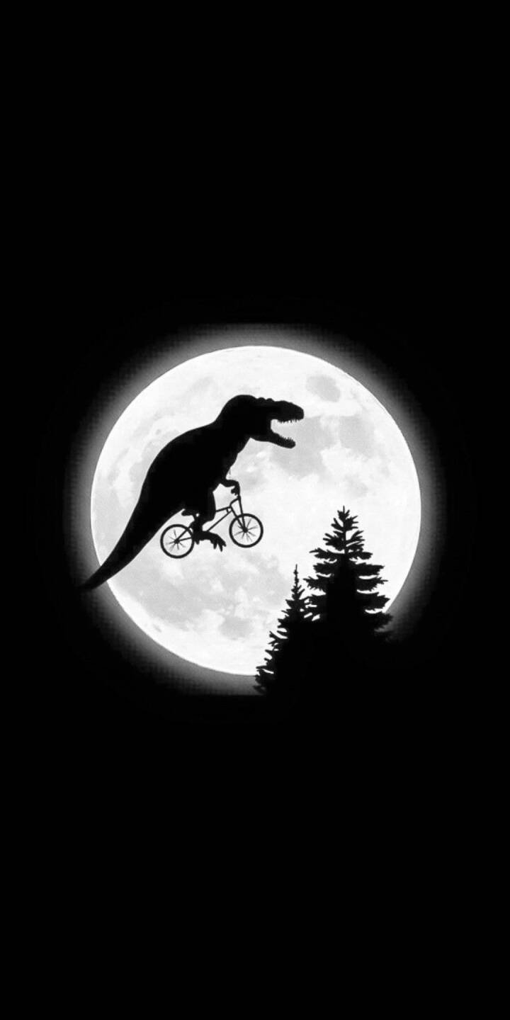 The iconic silhouette of a T-Rex on a bicycle against a bright full moon creates a humorous and minimalist 4K wallpaper. This captivating wallpaper is perfect for iPhone users seeking a unique and fun background. | dark The iconic silhouette of a T-Rex on a bicycle against a bright full moon creates a humorous and minimalist 4K wallpaper. This captivating wallpaper is perfect for iPhone users seeking a unique and fun background.