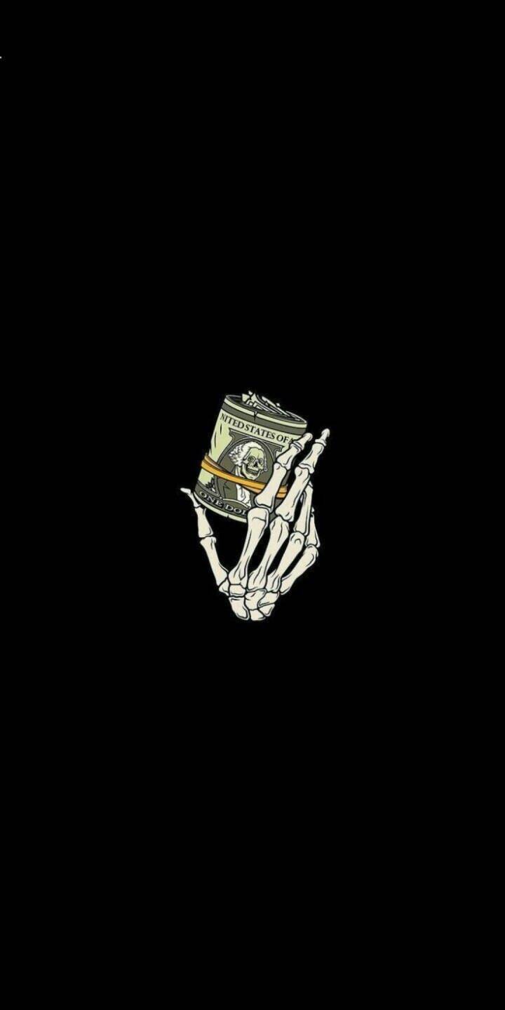 A stark white skeleton hand clutches a tightly rolled stack of dollar bills, secured with a rubber band, against a pure black background in this striking 4K wallpaper — an edgy wallpaper perfect for your iPhone lock screen. | dark A stark white skeleton hand clutches a tightly rolled stack of dollar bills, secured with a rubber band, against a pure black background in this striking 4K wallpaper — an edgy wallpaper perfect for your iPhone lock screen.