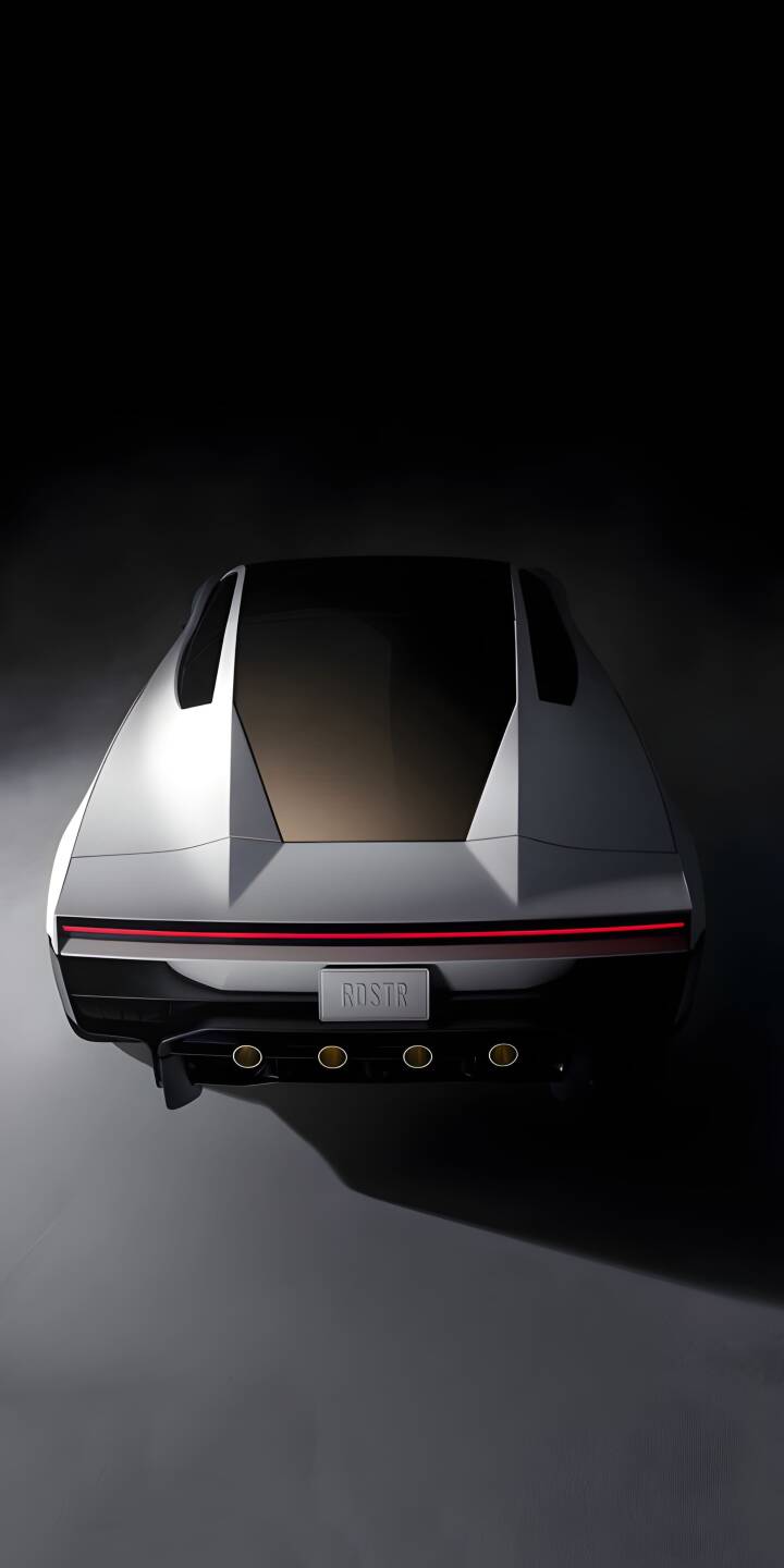 The striking red horizontal taillight illuminates the powerful rear design of the Hyundai N Vision 74 in this stunning 4K wallpaper, showcasing its retro-futuristic appeal and quad exhaust tips. This dramatic concept car wallpaper is perfect for any iPhone. | concept car iphone wallpaper mobile 4k wallpaper hd wallpaper automotive sleek retro-futuristic hyundai n vision 74 rdstr The striking red horizontal taillight illuminates the powerful rear design of the Hyundai N Vision 74 in this stunning 4K wallpaper, showcasing its retro-futuristic appeal and quad exhaust tips. This dramatic concept car wallpaper is perfect for any iPhone.