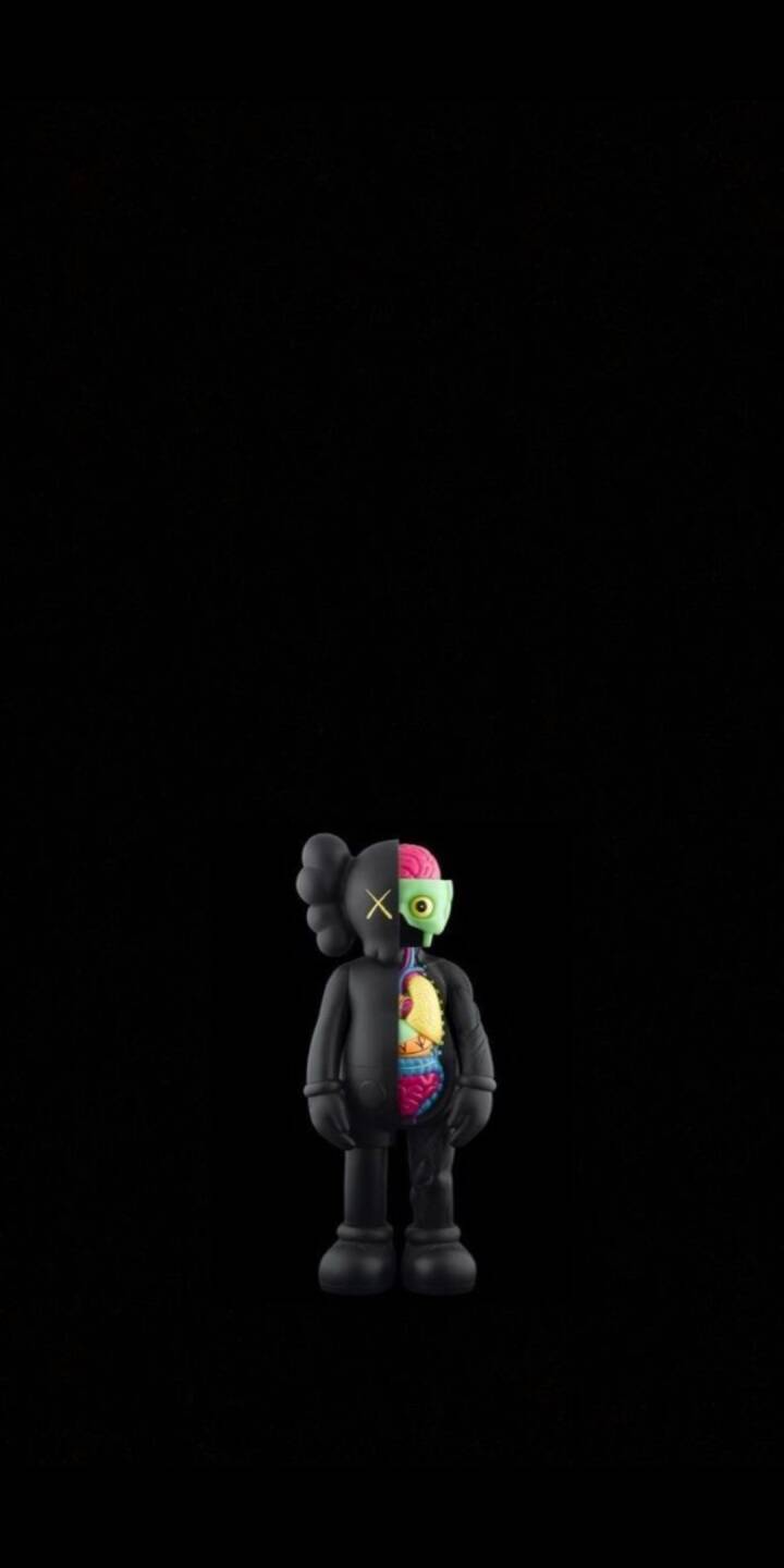 The KAWS Companion figure reveals its strikingly vibrant internal anatomy, including a split brain and colorful organs, set against its iconic black form with X-eyes in this dynamic 4K wallpaper. This unique KAWS art piece makes an eye-catching wallpaper for iPhone users. | art The KAWS Companion figure reveals its strikingly vibrant internal anatomy, including a split brain and colorful organs, set against its iconic black form with X-eyes in this dynamic 4K wallpaper. This unique KAWS art piece makes an eye-catching wallpaper for iPhone users.