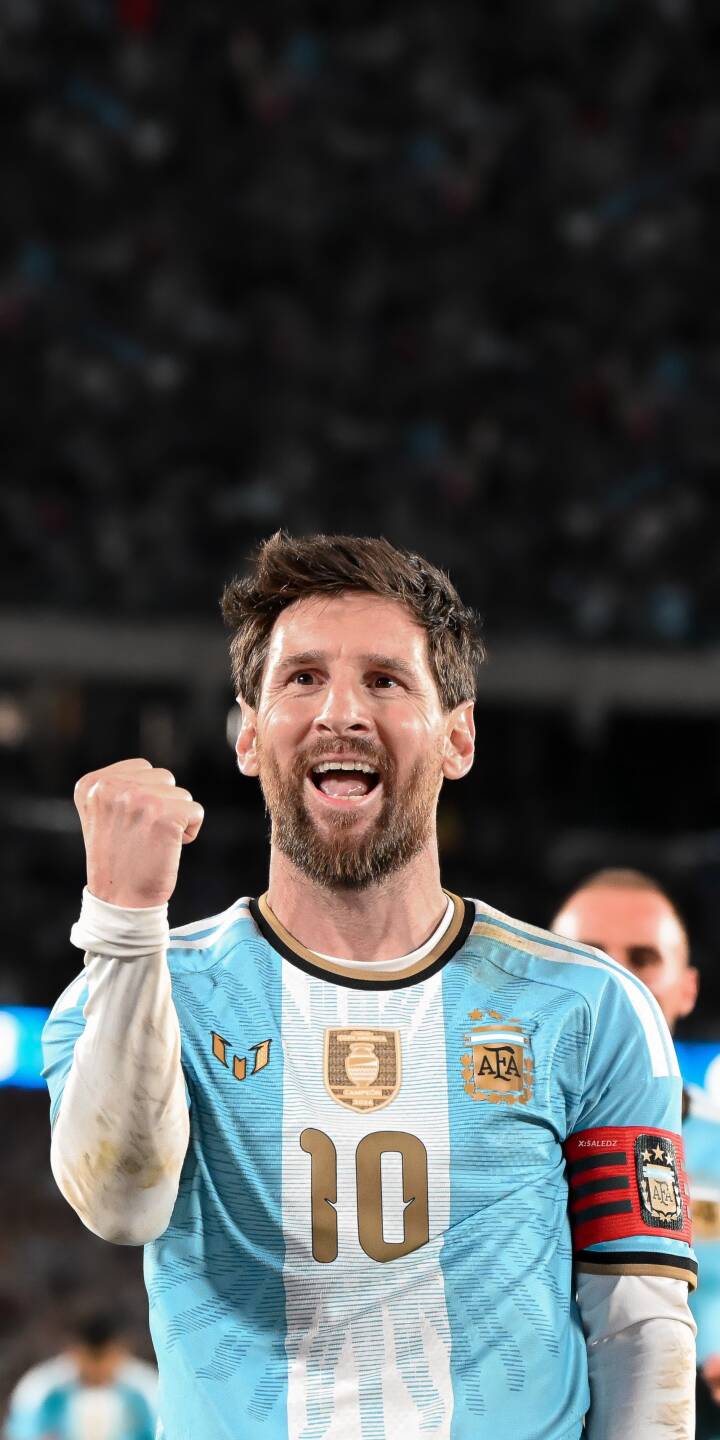 Lionel Messi's triumphant smile and raised fist capture a moment of pure joy in this striking 4K wallpaper. Fans will love this energetic wallpaper for their iPhone, showcasing the legendary #10 in his Argentina kit. | sports football celebration iphone messi argentina soccer wallpaper lionel messi mobile 4k wallpaper hd wallpaper Lionel Messi's triumphant smile and raised fist capture a moment of pure joy in this striking 4K wallpaper. Fans will love this energetic wallpaper for their iPhone, showcasing the legendary #10 in his Argentina kit.