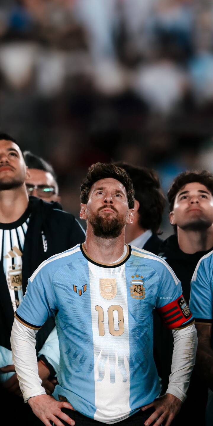 Lionel Messi gazes intently upwards, his iconic Argentina number 10 jersey and captain's armband prominently displayed in this striking 4K wallpaper. This vibrant football wallpaper is a must-have for any iPhone fan looking to adorn their screen with the legendary player. | sports football iphone messi argentina soccer wallpaper captain lionel messi mobile 4k wallpaper hd wallpaper Lionel Messi gazes intently upwards, his iconic Argentina number 10 jersey and captain's armband prominently displayed in this striking 4K wallpaper. This vibrant football wallpaper is a must-have for any iPhone fan looking to adorn their screen with the legendary player.