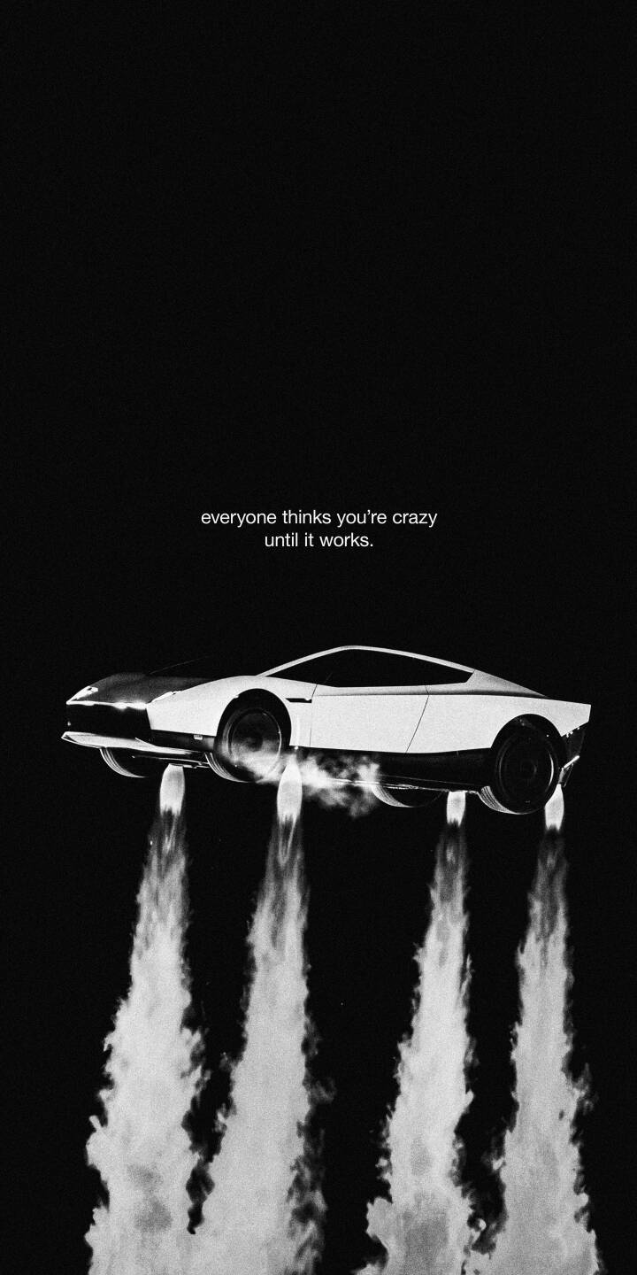 Billowing white propulsion jets beneath a sleek, levitating white car create a striking contrast against a pure black background in this inspirational 4K wallpaper. This stunning futuristic vehicle wallpaper, complete with a motivational quote, is perfect for your iPhone. | iphone wallpaper black and white flying car mobile 4k wallpaper hd wallpaper automotive levitation monochrome futuristic car inspirational Billowing white propulsion jets beneath a sleek, levitating white car create a striking contrast against a pure black background in this inspirational 4K wallpaper. This stunning futuristic vehicle wallpaper, complete with a motivational quote, is perfect for your iPhone.