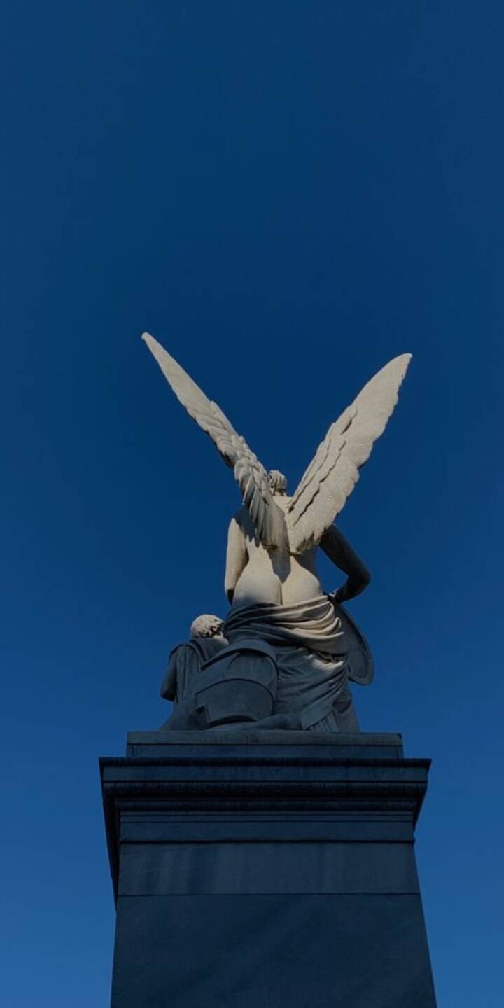 Majestic white marble wings unfurl against a stunning deep blue sky, capturing an inspiring view of this classical angel statue in beautiful 4K. This serene aesthetic makes for a perfect wallpaper on your iPhone, an elegant wallpaper for any device. | monument Majestic white marble wings unfurl against a stunning deep blue sky, capturing an inspiring view of this classical angel statue in beautiful 4K. This serene aesthetic makes for a perfect wallpaper on your iPhone, an elegant wallpaper for any device.