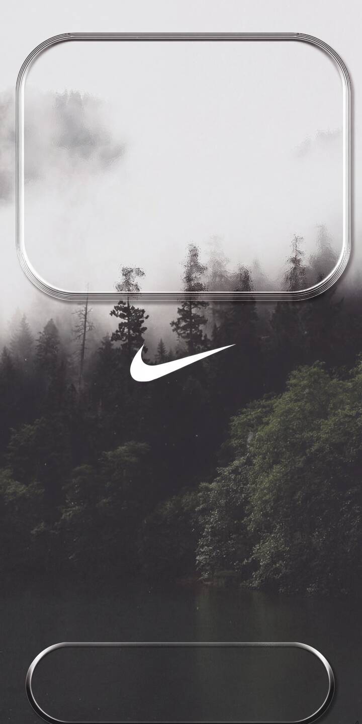 Misty tendrils of fog drift over dark evergreen trees, creating an ethereal ambiance in this striking 4K Nike wallpaper. The iconic white Nike swoosh stands out against the muted forest backdrop and calm lake surface, making it an ideal aesthetic wallpaper for iPhone. | landscape nike iphone nature wallpaper mobile 4k wallpaper hd wallpaper dark aesthetic misty forest serene nike swoosh Misty tendrils of fog drift over dark evergreen trees, creating an ethereal ambiance in this striking 4K Nike wallpaper. The iconic white Nike swoosh stands out against the muted forest backdrop and calm lake surface, making it an ideal aesthetic wallpaper for iPhone.