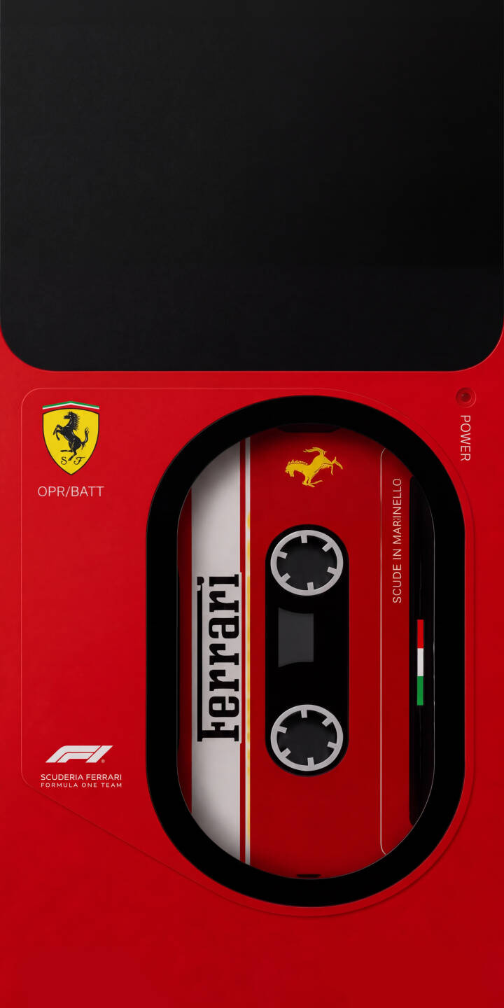 The iconic Ferrari prancing horse emblem proudly features on a vibrant red cassette tape, nestled within a sleek player outline, creating a dynamic 4K wallpaper that's perfect for your iPhone and embodies classic racing style. | red cassette iphone retro ferrari wallpaper racing scuderia formula one mobile 4k wallpaper hd wallpaper The iconic Ferrari prancing horse emblem proudly features on a vibrant red cassette tape, nestled within a sleek player outline, creating a dynamic 4K wallpaper that's perfect for your iPhone and embodies classic racing style.
