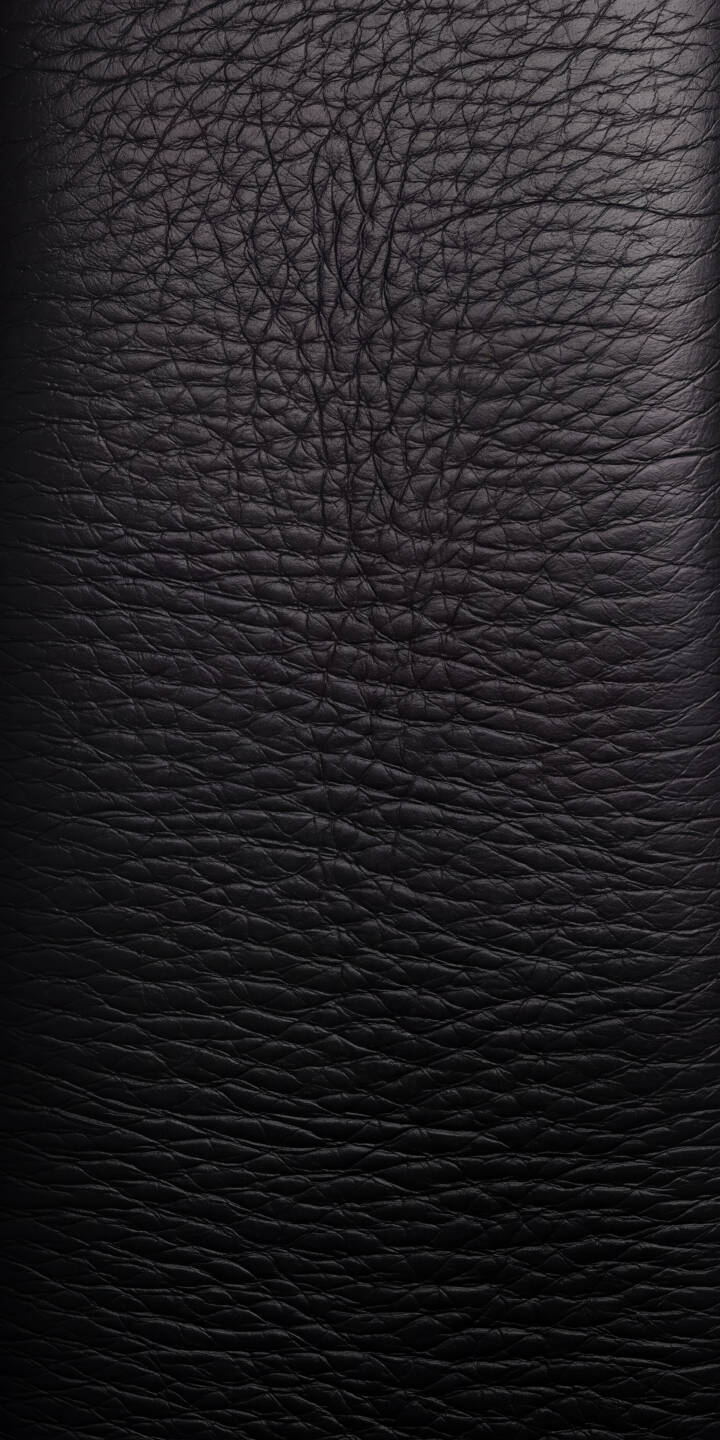 The intricate, subtle grain of deep black leather creates a sophisticated texture in this compelling 4K wallpaper, making it a perfect dark aesthetic wallpaper for iPhone. | dark iphone abstract minimalist wallpaper grain mobile 4k wallpaper hd wallpaper material black leather leather texture The intricate, subtle grain of deep black leather creates a sophisticated texture in this compelling 4K wallpaper, making it a perfect dark aesthetic wallpaper for iPhone.