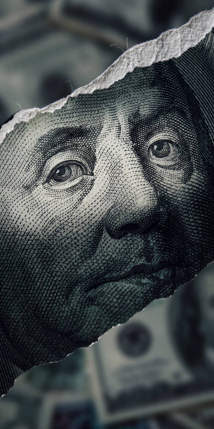 Benjamin Franklin's finely etched eyes pierce through a dramatically ripped hundred-dollar bill, showcasing the intricate details of the currency's engraving. This unique 4K wallpaper creates a striking, thought-provoking aesthetic for your iPhone screen. | dollar money currency iphone wallpaper texture mobile macro 4k wallpaper hd wallpaper ripped benjamin franklin Benjamin Franklin's finely etched eyes pierce through a dramatically ripped hundred-dollar bill, showcasing the intricate details of the currency's engraving. This unique 4K wallpaper creates a striking, thought-provoking aesthetic for your iPhone screen.