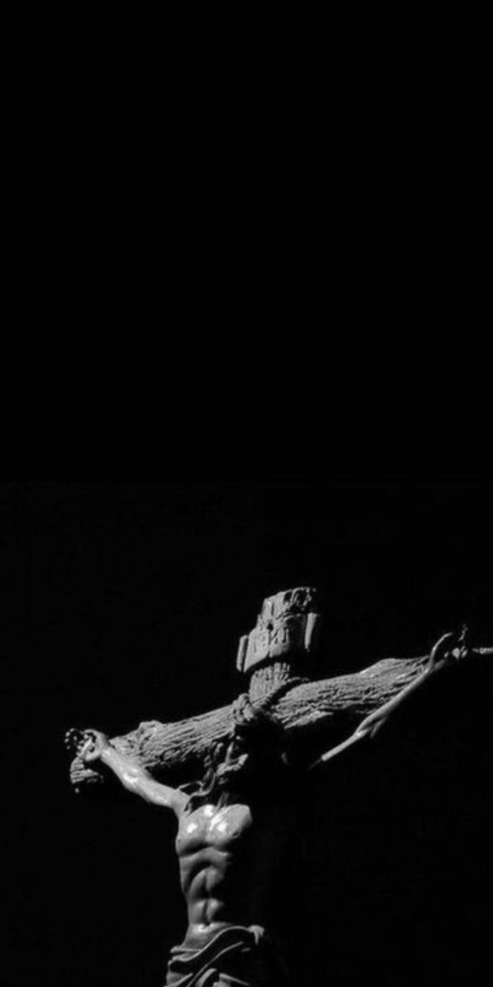 Striking, high-contrast monochrome lighting illuminates Christ on the rugged wooden cross in this powerful 4K wallpaper. This profound imagery, highlighting the dramatic shadows and sculptural detail, makes it an impactful wallpaper for iPhone users. | jesus Striking, high-contrast monochrome lighting illuminates Christ on the rugged wooden cross in this powerful 4K wallpaper. This profound imagery, highlighting the dramatic shadows and sculptural detail, makes it an impactful wallpaper for iPhone users.
