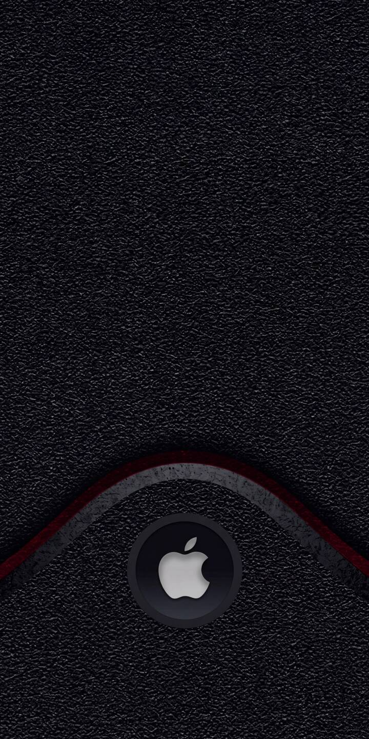 The iconic white Apple logo, encased in a dark circular emblem, stands out against a rich textured black background with a subtle wavy red line accent, creating a sophisticated 4K wallpaper experience for your iPhone. | black dark apple iphone minimal wallpaper tech apple logo mobile 4k wallpaper hd wallpaper textured The iconic white Apple logo, encased in a dark circular emblem, stands out against a rich textured black background with a subtle wavy red line accent, creating a sophisticated 4K wallpaper experience for your iPhone.