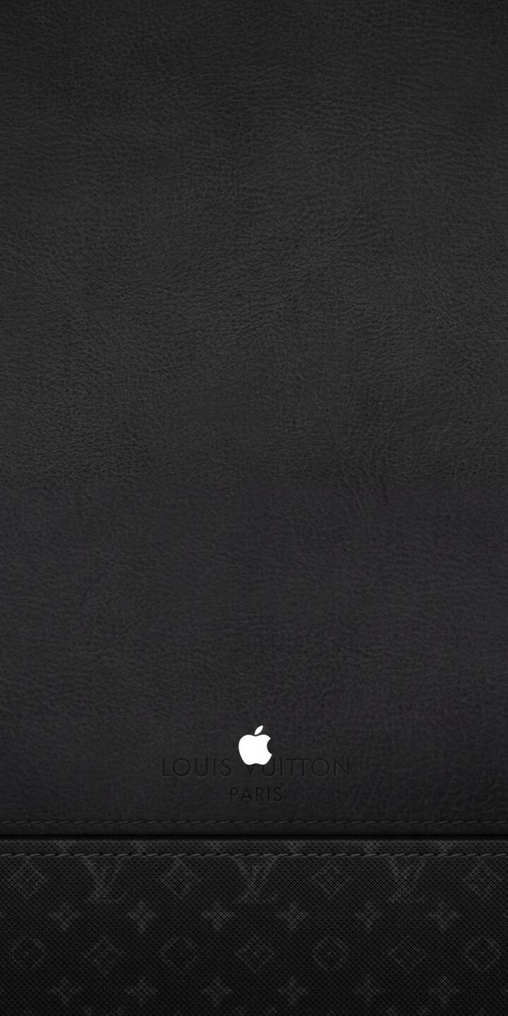The sophisticated black leather texture provides a luxurious backdrop for the crisp white Apple logo, subtly overlaid with Louis Vuitton Paris embossing in this exclusive 4K wallpaper. A perfect designer wallpaper for iPhone, it seamlessly blends high fashion and tech aesthetics. | black apple iphone luxury lv wallpaper leather louis vuitton mobile 4k wallpaper hd wallpaper designer The sophisticated black leather texture provides a luxurious backdrop for the crisp white Apple logo, subtly overlaid with Louis Vuitton Paris embossing in this exclusive 4K wallpaper. A perfect designer wallpaper for iPhone, it seamlessly blends high fashion and tech aesthetics.