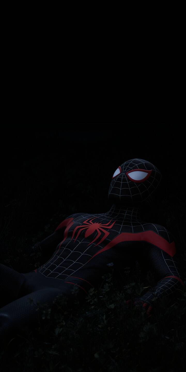 The glowing white eyes and signature red spider emblem of Miles Morales's suit are subtly illuminated in this deeply shadowed 4K wallpaper, making for an intense and moody iPhone wallpaper. | aesthetic dark marvel spiderman iphone wallpaper miles morales mobile moody 4k wallpaper hd wallpaper spider-man The glowing white eyes and signature red spider emblem of Miles Morales's suit are subtly illuminated in this deeply shadowed 4K wallpaper, making for an intense and moody iPhone wallpaper.