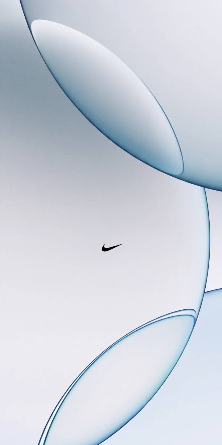 The iconic black Nike swoosh logo floats gracefully against a clean, light grey background, surrounded by soft, translucent blue abstract bubble shapes in this minimalist 4K wallpaper. This sophisticated brand wallpaper is perfect for personalizing your iPhone. | blue logo brand nike iphone abstract minimal wallpaper mobile 4k wallpaper hd wallpaper swoosh The iconic black Nike swoosh logo floats gracefully against a clean, light grey background, surrounded by soft, translucent blue abstract bubble shapes in this minimalist 4K wallpaper. This sophisticated brand wallpaper is perfect for personalizing your iPhone.