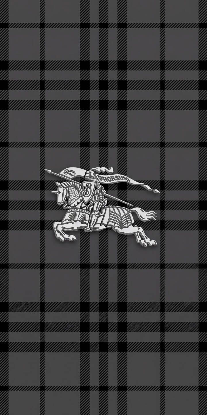 The iconic silver Burberry Equestrian Knight logo takes center stage against a sophisticated gray and black plaid background in this luxurious 4K wallpaper — an elegant wallpaper choice for iPhone users. | brand plaid iphone luxury wallpaper burberry mobile 4k wallpaper hd wallpaper monochrome equestrian knight burberry logo The iconic silver Burberry Equestrian Knight logo takes center stage against a sophisticated gray and black plaid background in this luxurious 4K wallpaper — an elegant wallpaper choice for iPhone users.