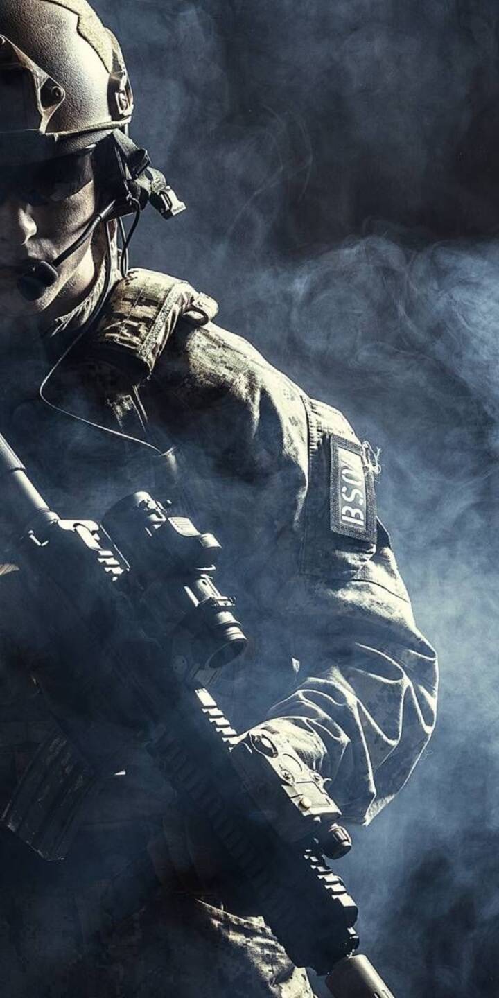 Swirling smoke billows mysteriously around a tactical operator in full gear, clutching an assault rifle with grim determination in this high-resolution 4K wallpaper. This intense combat wallpaper is an excellent choice for any iPhone looking for a fierce and detailed background. | artist Swirling smoke billows mysteriously around a tactical operator in full gear, clutching an assault rifle with grim determination in this high-resolution 4K wallpaper. This intense combat wallpaper is an excellent choice for any iPhone looking for a fierce and detailed background.