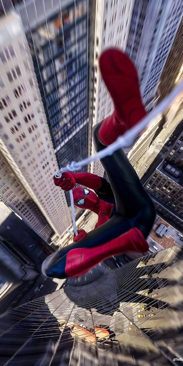 Spider-Man descends dramatically through a dizzying blur of towering city skyscrapers, web-slinging with precision in this incredible 4K wallpaper for iPhone. This action-packed wallpaper perfectly captures the hero's acrobatic agility. | spider-man Spider-Man descends dramatically through a dizzying blur of towering city skyscrapers, web-slinging with precision in this incredible 4K wallpaper for iPhone. This action-packed wallpaper perfectly captures the hero's acrobatic agility.