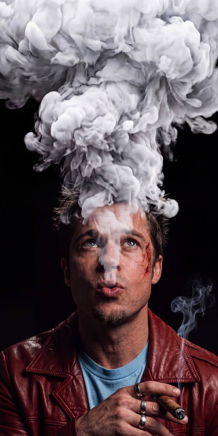 A dramatic plume of smoke billows above Brad Pitt's iconic Tyler Durden, who sports a bloody cheek, red leather jacket, and rings while holding a glowing cigar in this striking 4K wallpaper. This intense visual is a must-have wallpaper for your iPhone. | smoke cigar iphone fight club wallpaper tyler durden brad pitt red jacket mobile 4k wallpaper hd wallpaper cinematic A dramatic plume of smoke billows above Brad Pitt's iconic Tyler Durden, who sports a bloody cheek, red leather jacket, and rings while holding a glowing cigar in this striking 4K wallpaper. This intense visual is a must-have wallpaper for your iPhone.