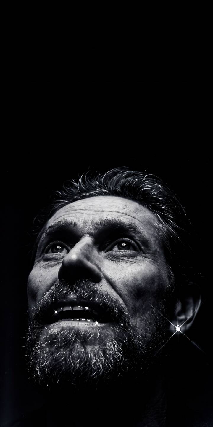 The intense black and white contrast accentuates Willem Dafoe's grizzled features as he looks upward with a thoughtful gaze in this striking 4K wallpaper. A subtle sparkle near his ear adds depth to this dramatic portrait, making it a perfect wallpaper for iPhone. | man portrait iphone wallpaper black and white mobile 4k wallpaper hd wallpaper monochrome gritty dramatic bearded man The intense black and white contrast accentuates Willem Dafoe's grizzled features as he looks upward with a thoughtful gaze in this striking 4K wallpaper. A subtle sparkle near his ear adds depth to this dramatic portrait, making it a perfect wallpaper for iPhone.