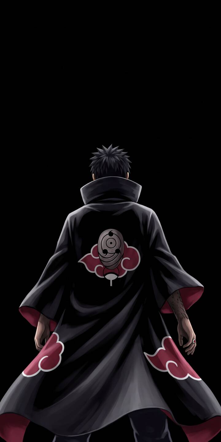 Obito Uchiha's imposing figure, clad in the iconic Akatsuki cloak with its distinct red clouds and Tobi mask symbol on the back, dominates this striking 4K wallpaper — a powerful statement wallpaper for any iPhone. | aesthetic dark anime naruto iphone akatsuki wallpaper mobile 4k wallpaper hd wallpaper obito uchiha tobi Obito Uchiha's imposing figure, clad in the iconic Akatsuki cloak with its distinct red clouds and Tobi mask symbol on the back, dominates this striking 4K wallpaper — a powerful statement wallpaper for any iPhone.