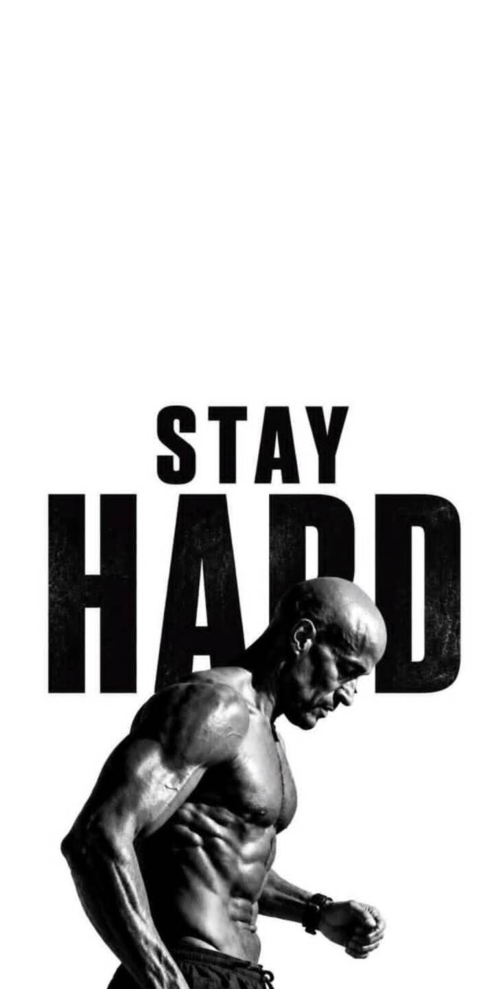 Sweat shines on a focused, muscular physique, epitomizing dedication beneath the powerful 'STAY HARD' text in this high-contrast 4K fitness wallpaper, an ideal motivational wallpaper for iPhone users. | artist Sweat shines on a focused, muscular physique, epitomizing dedication beneath the powerful 'STAY HARD' text in this high-contrast 4K fitness wallpaper, an ideal motivational wallpaper for iPhone users.