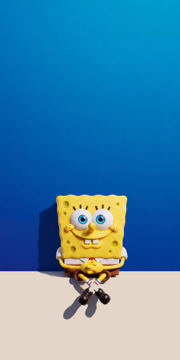 A cheerful Spongebob Squarepants figure smiles broadly with clasped hands against a vibrant blue background in this crisp 4K wallpaper. This delightful wallpaper, showcasing Spongebob in a simple yet iconic pose, is perfect for any iPhone. | cartoon spongebob iphone minimalist wallpaper animation mobile spongebob squarepants 4k wallpaper hd wallpaper blue background cheerful A cheerful Spongebob Squarepants figure smiles broadly with clasped hands against a vibrant blue background in this crisp 4K wallpaper. This delightful wallpaper, showcasing Spongebob in a simple yet iconic pose, is perfect for any iPhone.