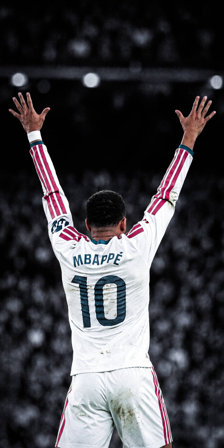 Mbappé's jubilant arms reach skyward, showcasing his iconic 'MBAPPE 10' white jersey and slightly soiled shorts against a desaturated stadium background in this striking 4K wallpaper, making it a perfect iPhone wallpaper for fans. | football celebration iphone mbappe soccer wallpaper sport mobile 4k wallpaper hd wallpaper triumph kylian mbappe Mbappé's jubilant arms reach skyward, showcasing his iconic 'MBAPPE 10' white jersey and slightly soiled shorts against a desaturated stadium background in this striking 4K wallpaper, making it a perfect iPhone wallpaper for fans.