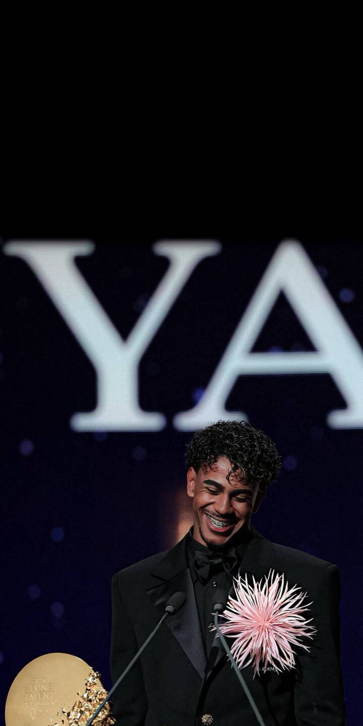 A beaming smile and visible braces light up the face of this curly-haired award recipient, proudly wearing a striking pink corsage on his black suit in this 4K wallpaper. This captivating event wallpaper is perfect for your iPhone, showcasing a moment of pure joy and success. | portrait smile celebration iphone wallpaper mobile event formal 4k wallpaper hd wallpaper award winner pink corsage A beaming smile and visible braces light up the face of this curly-haired award recipient, proudly wearing a striking pink corsage on his black suit in this 4K wallpaper. This captivating event wallpaper is perfect for your iPhone, showcasing a moment of pure joy and success.