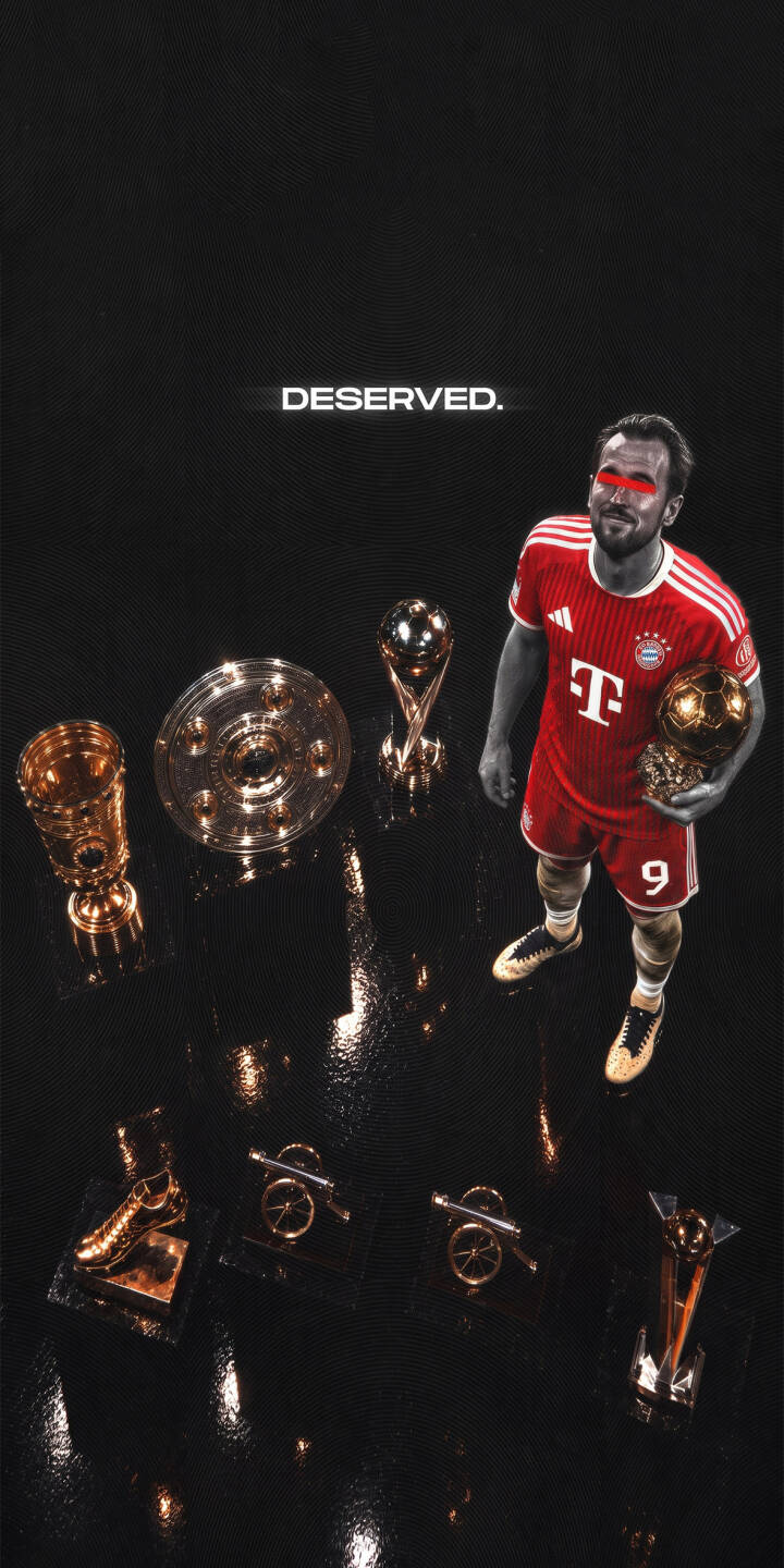 A prominent red bar streaks across Harry Kane's eyes as he stands proudly in his red Bayern Munich kit, gripping a golden football trophy amidst a collection of gleaming awards in this striking 4K wallpaper. This powerful visual makes for an excellent mobile wallpaper on any iPhone. | football iphone wallpaper trophies champion mobile 4k wallpaper hd wallpaper red kit bayern munich harry kane deserved A prominent red bar streaks across Harry Kane's eyes as he stands proudly in his red Bayern Munich kit, gripping a golden football trophy amidst a collection of gleaming awards in this striking 4K wallpaper. This powerful visual makes for an excellent mobile wallpaper on any iPhone.