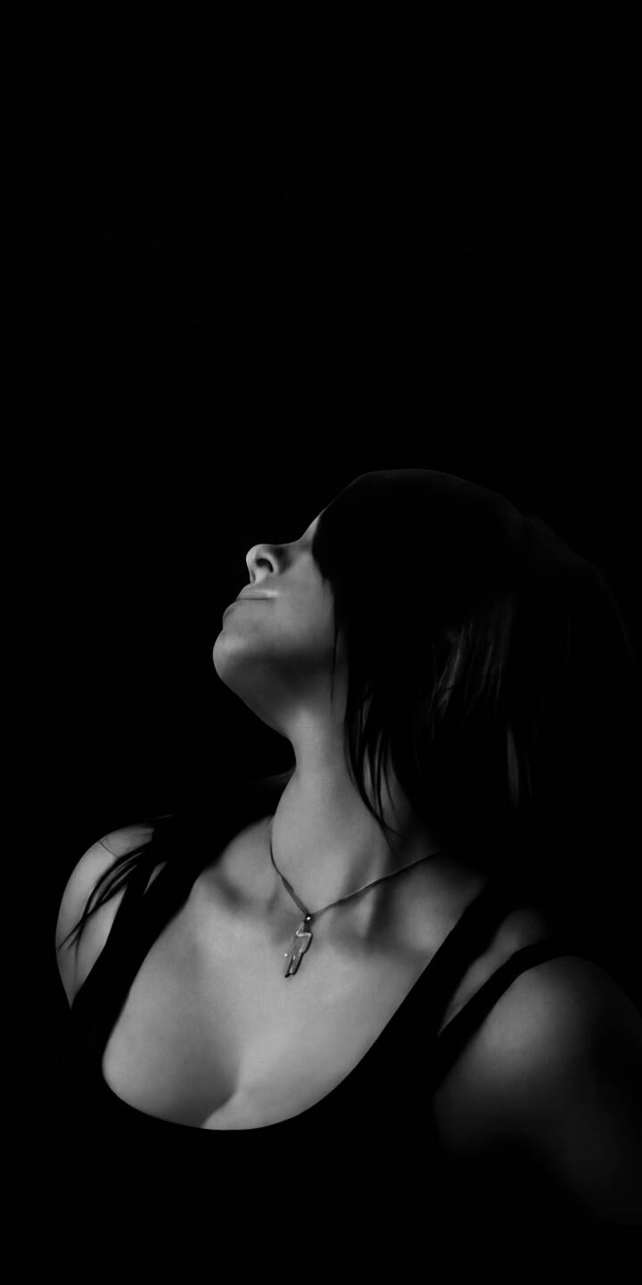 Dramatic light carves out the mysterious profile of a woman with an upward gaze, her dark hair casting shadows in this captivating 4K black and white wallpaper. This evocative dark aesthetic makes for a striking wallpaper for iPhone. | girl woman portrait iphone wallpaper black and white mobile 4k wallpaper hd wallpaper dark aesthetic monochrome female Dramatic light carves out the mysterious profile of a woman with an upward gaze, her dark hair casting shadows in this captivating 4K black and white wallpaper. This evocative dark aesthetic makes for a striking wallpaper for iPhone.