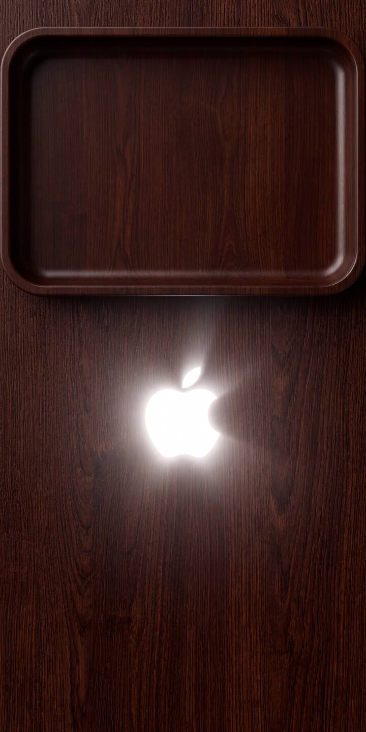 The iconic Apple logo glows brightly against a rich, dark brown wood grain background in this captivating 4K wallpaper. This stunning wallpaper for iPhone features a subtle recessed top section, adding depth and elegance to your device. | aesthetic apple iphone minimalist wallpaper apple logo mobile glowing 4k wallpaper hd wallpaper dark wood wood texture The iconic Apple logo glows brightly against a rich, dark brown wood grain background in this captivating 4K wallpaper. This stunning wallpaper for iPhone features a subtle recessed top section, adding depth and elegance to your device.