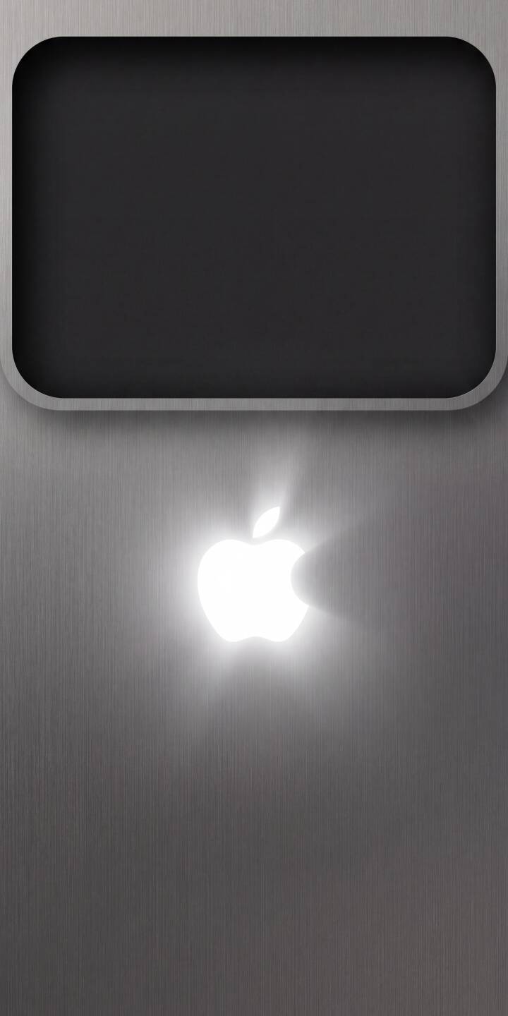 The iconic Apple logo shines brightly against a sleek, brushed metallic background in this minimalist 4K wallpaper. This clean wallpaper for iPhone offers a sophisticated look, with a dark rounded cutout perfectly framing the top of your screen. | dark apple iphone minimalist wallpaper technology apple logo mobile glowing 4k wallpaper hd wallpaper brushed metal The iconic Apple logo shines brightly against a sleek, brushed metallic background in this minimalist 4K wallpaper. This clean wallpaper for iPhone offers a sophisticated look, with a dark rounded cutout perfectly framing the top of your screen.